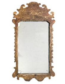Chippendale style carved and gilded wood mirror; leaf and swag motif; approximately 37" x 17" (worn
