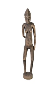 A Senufo Tyekpa Standing Maternity Figure - West Africa., Senufo Peoples. A life-sized carved wood