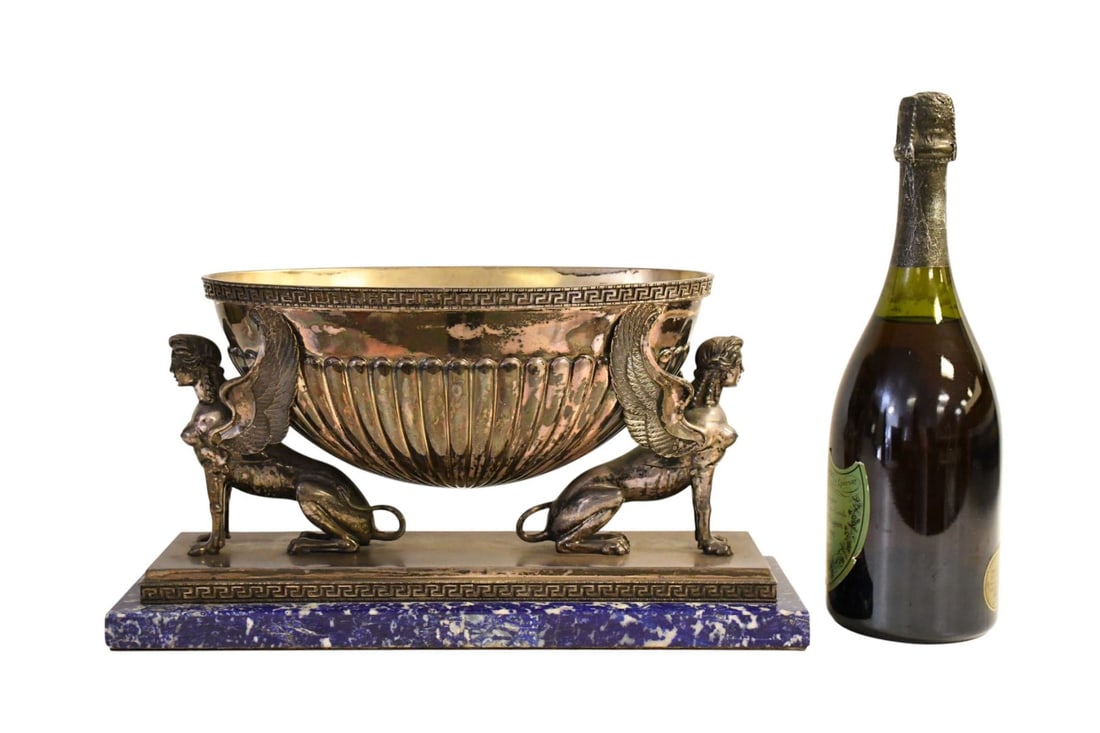 Italian Sterling Silver Neoclassical Style Centerpiece Bowl, first half 20th century. Bowl with: Italian Sterling Silver Neoclassical Style Centerpiece Bowl, first half 20th century. Bowl with gadrooned body and Greek key border, supported by opposing winged Greek sphinxes on a rectangular plinth