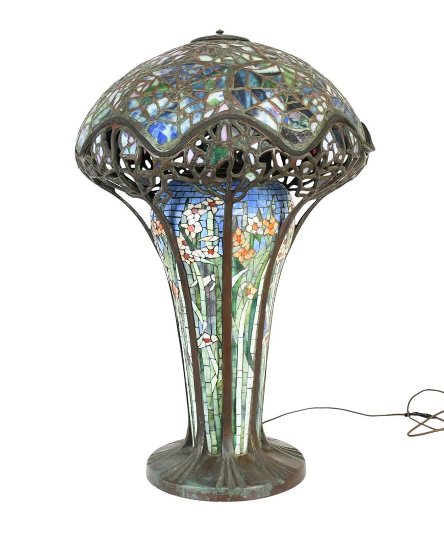 Tiffany Style Cobweb Lamp - A Tiffany-style leaded glass lamp, cobweb pattern shade and white: Tiffany Style Cobweb Lamp - A Tiffany-style leaded glass lamp, cobweb pattern shade and white narcissus base. Three-light fixture. Modeled after the Barbra Streisand Cobweb lamp sold at Christie's New