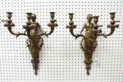 Pair Antique French Bronze Three Branch Figural Sconces - A pair of bronze three-armed candelabra