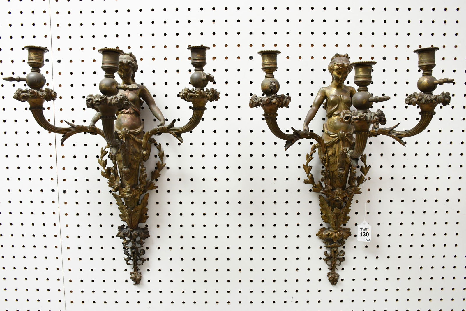 Pair Antique French Bronze Three Branch Figural Sconces - A pair of bronze three-armed candelabra: Pair Antique French Bronze Three Branch Figural Sconces - A pair of bronze three-armed candelabra wall sconces featuring a classical nymph figure, with acanthus and grape motif details. Originally a g