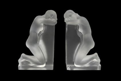Pair Lalique France 'Reverie' Crystal Bookends - A pair of Lalique figural bookends in clear frosted
