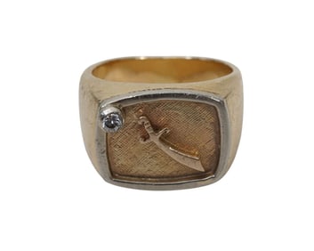 14K Yellow Gold Masonic Sword Signet Ring. Size 11, wt. 25.7 grams. Ring has a small diamond accent.