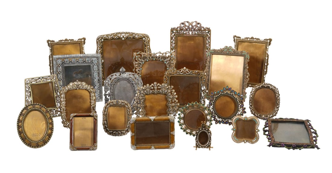 21 Berebi Jeweled Type Assorted Frames & One Jay Strongwater Frame, 8 1/2"h x 7"w Largest (back: 21 Berebi Jeweled Type Assorted Frames & One Jay Strongwater Frame, (back stand missing)One frame is missing 3 pearls. 4 of the frames on the back have had 1 screw replaced. 2 of the frames are