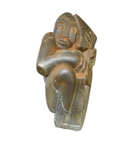 Large Weathered African serpentine stone sculpture of figure with instrument,  some age cracks and