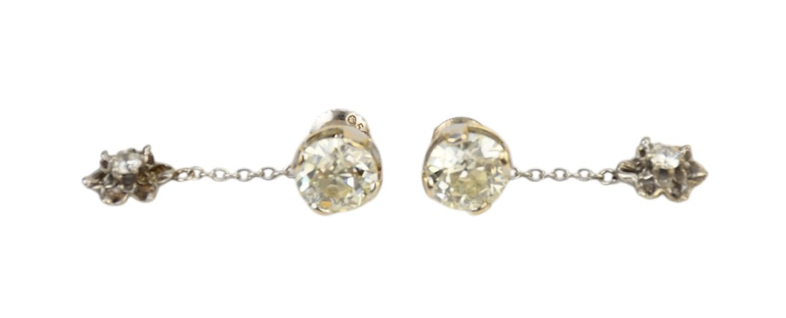 4 tcw 14k White Gold Diamond Stud Earring. 2 cts each H-J SI1-2 with Diamond charms 1" screw backs (: 4 tcw 14k White Gold Diamond Stud Earring. 2 cts each H-J SI1-2 with Diamond charms 1" screw backs ( 1 of the backs needs replacing does not screw in)