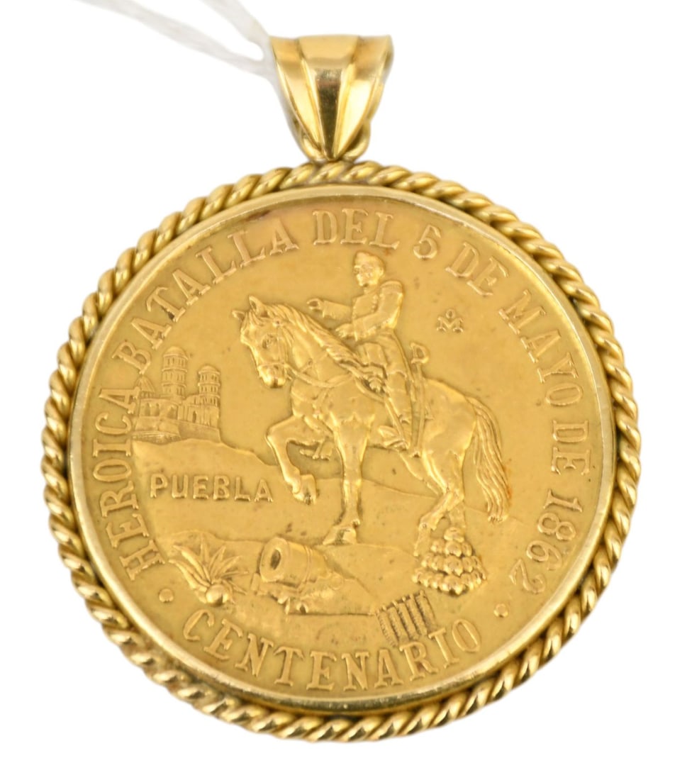 1962 Mexico Gold Cinco De Mayo Centenario Medal Pendant– a medal commemorating the centennial of: 1962 Mexico Gold Cinco De Mayo Centenario Medal Pendant– a medal commemorating the centennial of the battle of May 5, 1862. This coin was minted in 1962 as a gold coin with a .900 fineness. Weight: