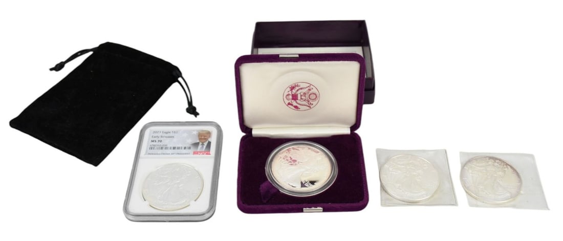4 - American Eagle Silver Dollar. Uncirculated 1986, (2) 2011 and 2023 early release MS70 (1 of 5)