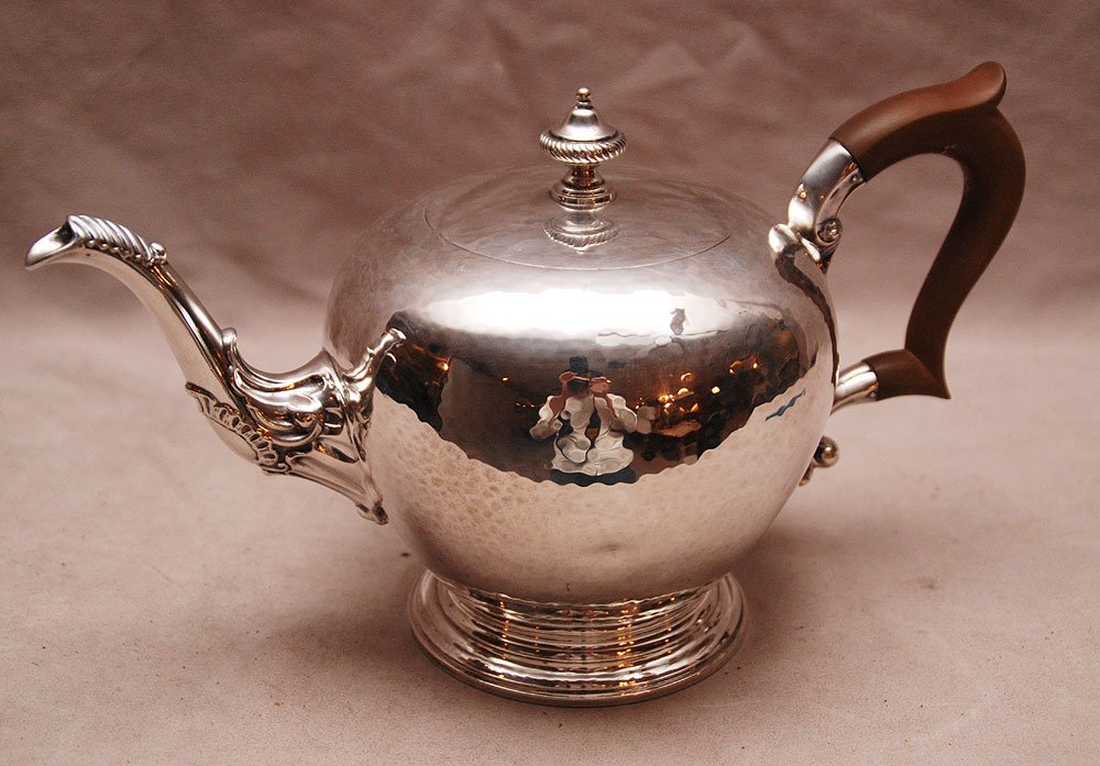 Sterling teapot with wood handle, 26oz, 6"h x 11"w: Sterling teapot with wood handle, 26oz, 6"h x 11"w