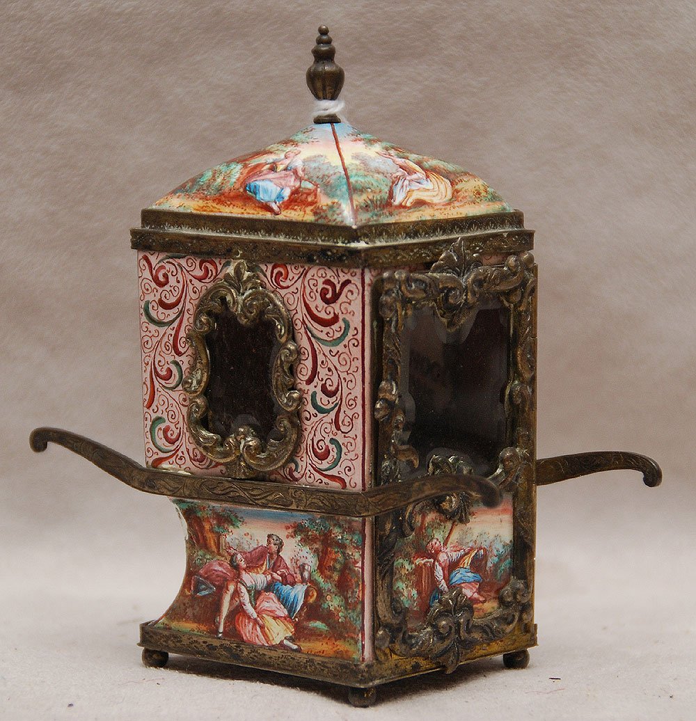A VIENNESE SILVER AND ENAMEL MINIATURE SEDAN CHAIR. Vie: A VIENNESE SILVER AND ENAMEL MINIATURE SEDAN CHAIR. Vienna, Austria, circa 1900. 3 1/2"h x 3 7/8"w