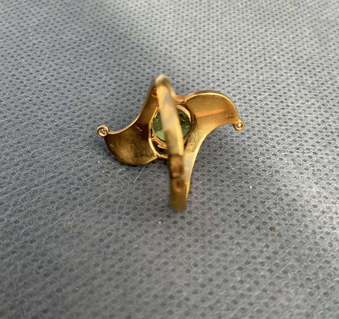 Russian Antique Gold 2.99 ct. GIA Demantoid Garnet ring size: Russian Antique Gold 2.99 ct. GIA Demantoid Garnet ring size 7 Beautiful Russian Antique 14kt. gold with 2.99 ct. Demantoid garnet, 2 small single cut diamonds and red enamel, stamped 56 and maker mar