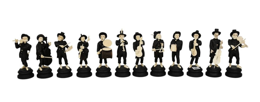 12 German Black Forest carved folk musician figurines, carved in Baroque revival style, 6 1/2 inches: 12 German Black Forest carved folk musician figurines, carved in Baroque revival style, 6 1/2 inches tall by 2 inches diameter base