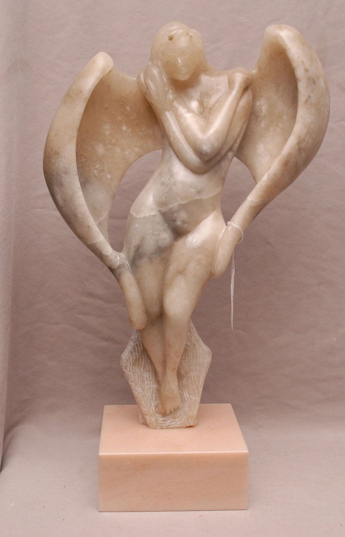 Alabaster angel sculpture on attached pink marble base,: Alabaster angel sculpture on attached pink marble base, figure is 20"h (This item is being offered to the public again. This item was bid on and never paid for at our April 23 auction by Mr. Lee, 7 Ca