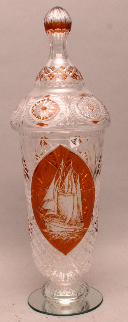 Oversized cut glass vase with lid, amber panels and: Oversized cut glass vase with lid, amber panels and painted clipper ship, attached mirror at base, 38"h