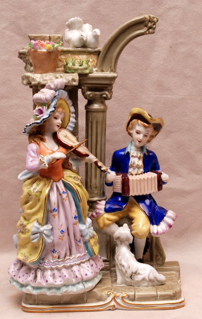 European figural porcelain piece of 2 musicians playing: European figural porcelain piece of 2 musicians playing accordion & violin, 13"h x 7"w