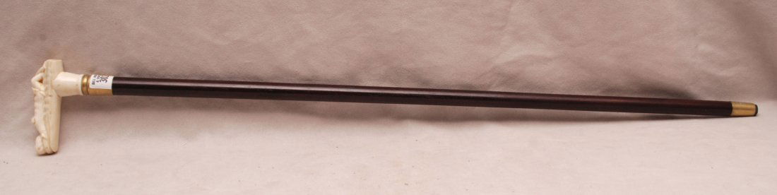 Walking stick with Marine ivory reclining woman handle,: Walking stick with Marine ivory reclining woman handle, 34"L