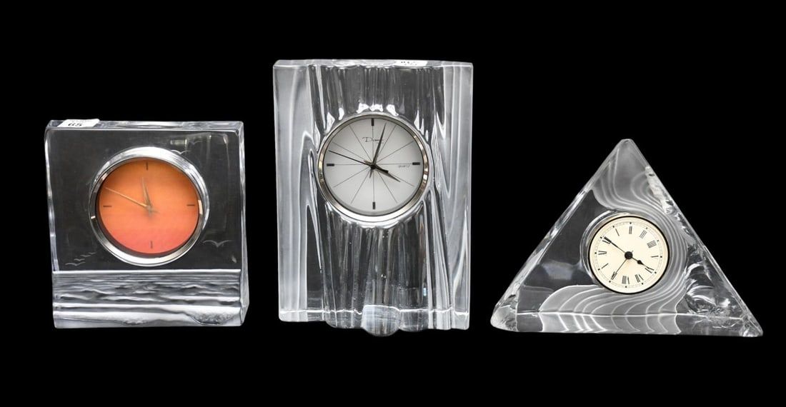 3 Daum France Crystal Table Clocks, tallest 9 x 7 inches. one is 7 x 6 1/2 inches and the pyramid: 3 Daum France Crystal Table Clocks, tallest 9 x 7 inches. one is 7 x 6 1/2 inches and the pyramid triangular clock is 7 inches tall by 9 inches wide, triangular pyramid shaped clock has a few chips. O
