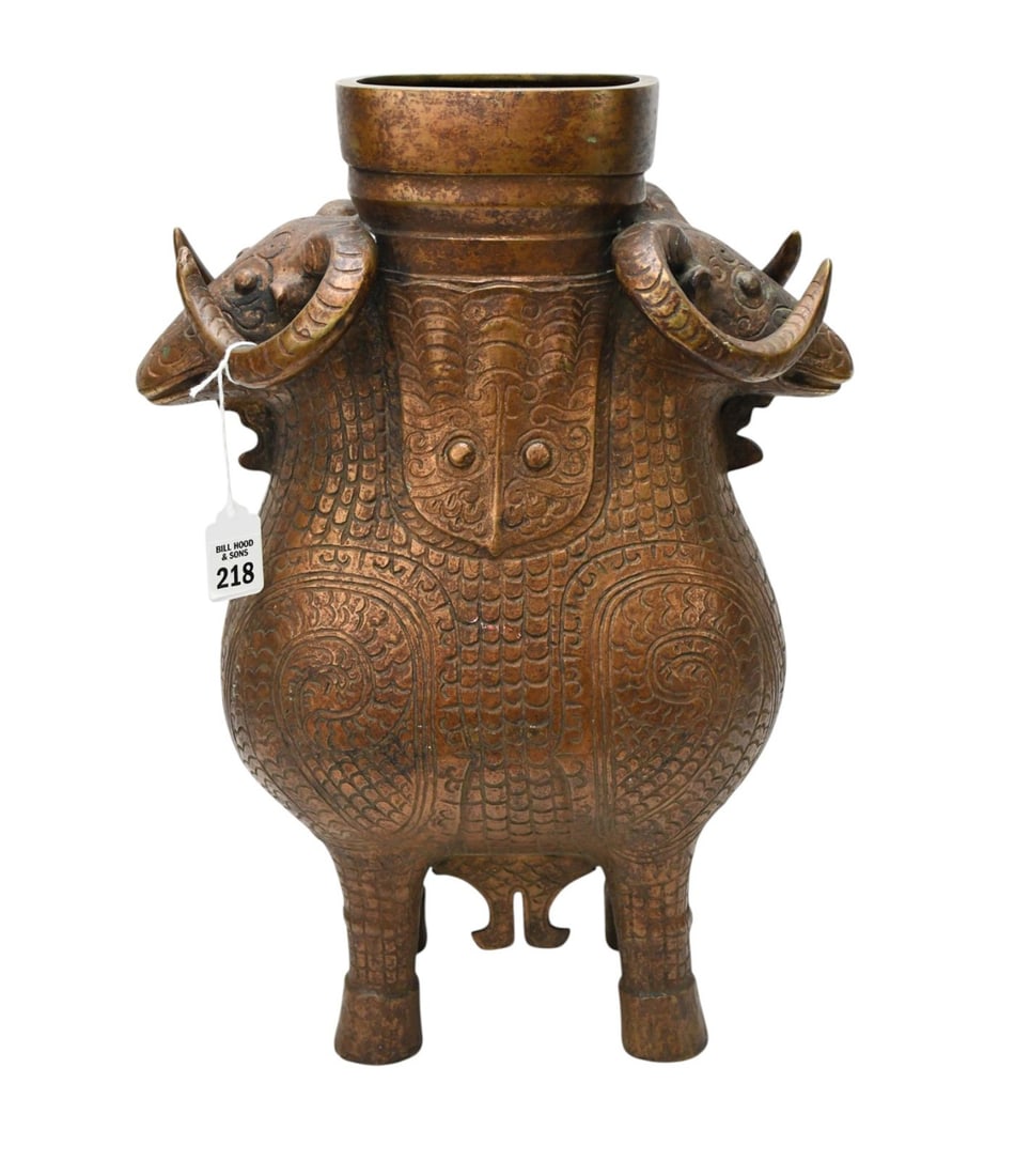 This is an Archaistic Chinese Zun Style bronze vessel, designed in the style of the Shang Dynasty. (1 of 5)
