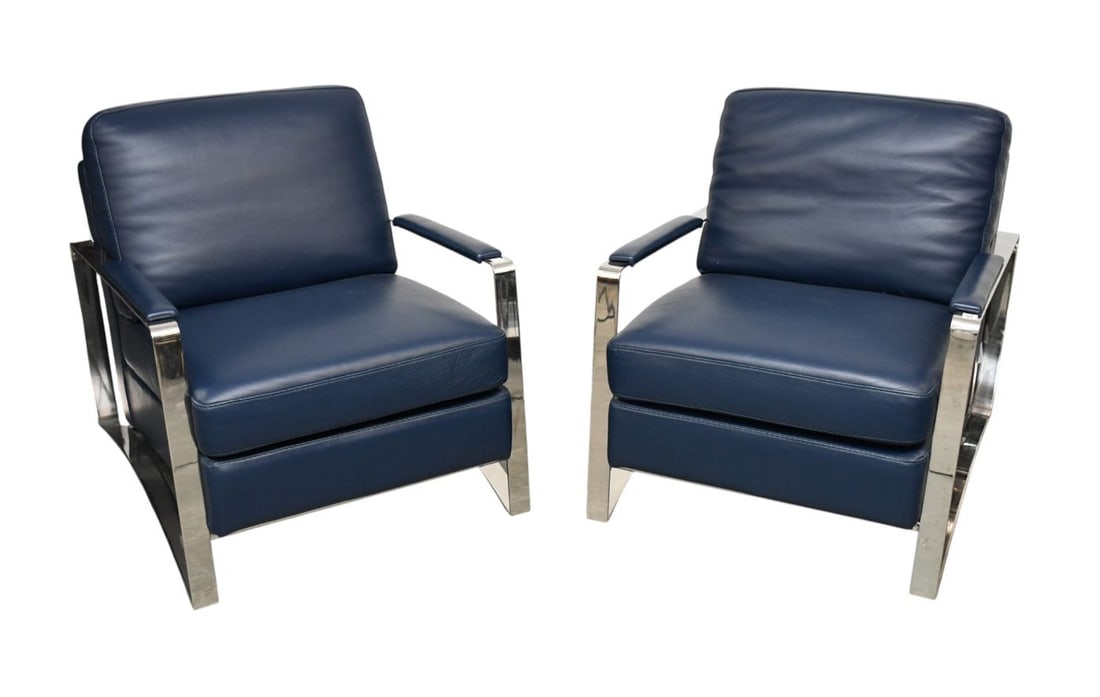 Pair of Blue Leather and Steel Italian Nicoline Armchairs, 21st century H. 31? x W. 26? Condition:: Pair of Blue Leather and Steel Italian Nicoline Armchairs, 21st century H. 31? x W. 26? Condition: Good***If this item is not picked up by the Friday following the auction, it will be moved to offsite