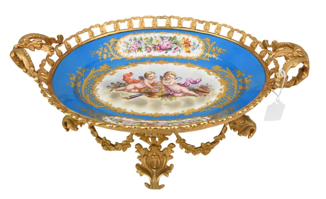 Oval Sevres Porcelain Centerpiece, Cupid painted Center Medallion with Gilt Accents With Dore': Oval Sevres Porcelain Centerpiece, Cupid painted Center Medallion with Gilt Accents With Dore' Bronze Frame, 7 1/2"h x 18"w x 10 3/4"d