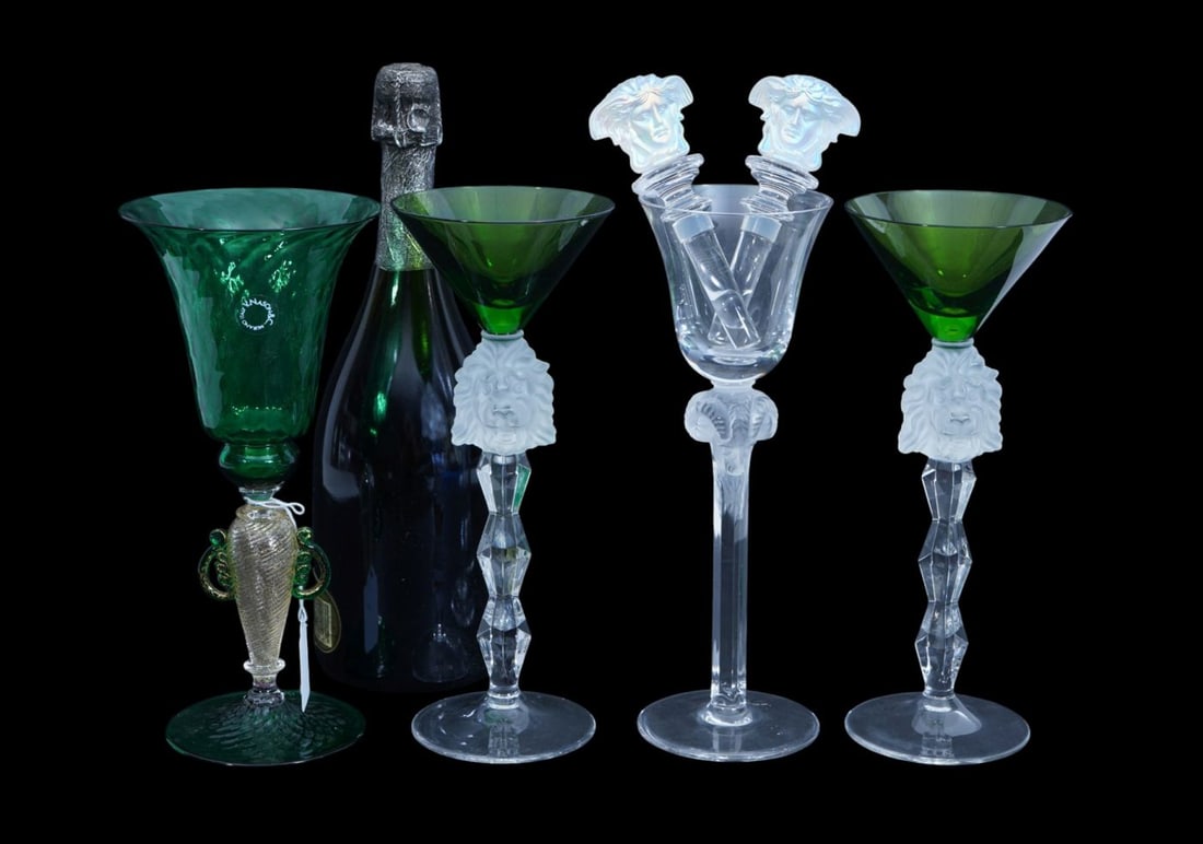 4 Fancy Stemmed Wine Glasses, Venetian Green Glass, One Nachtmann with Ram and 2 Green Stems with: 4 Fancy Stemmed Wine Glasses, Venetian Green Glass, One Nachtmann with Ram and 2 Green Stems with Lion Heads (Approx. 10"h x 4"w) AND 2 Versace Crystal Stoppers