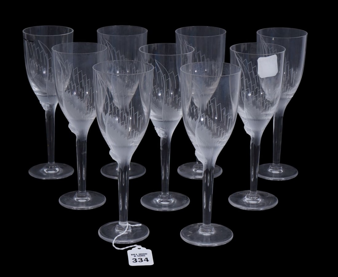 Set of 8 Lalique Angel Champagne Flutes: Lalique crystal Angel patterned champagne flutes, having (1 of 7)