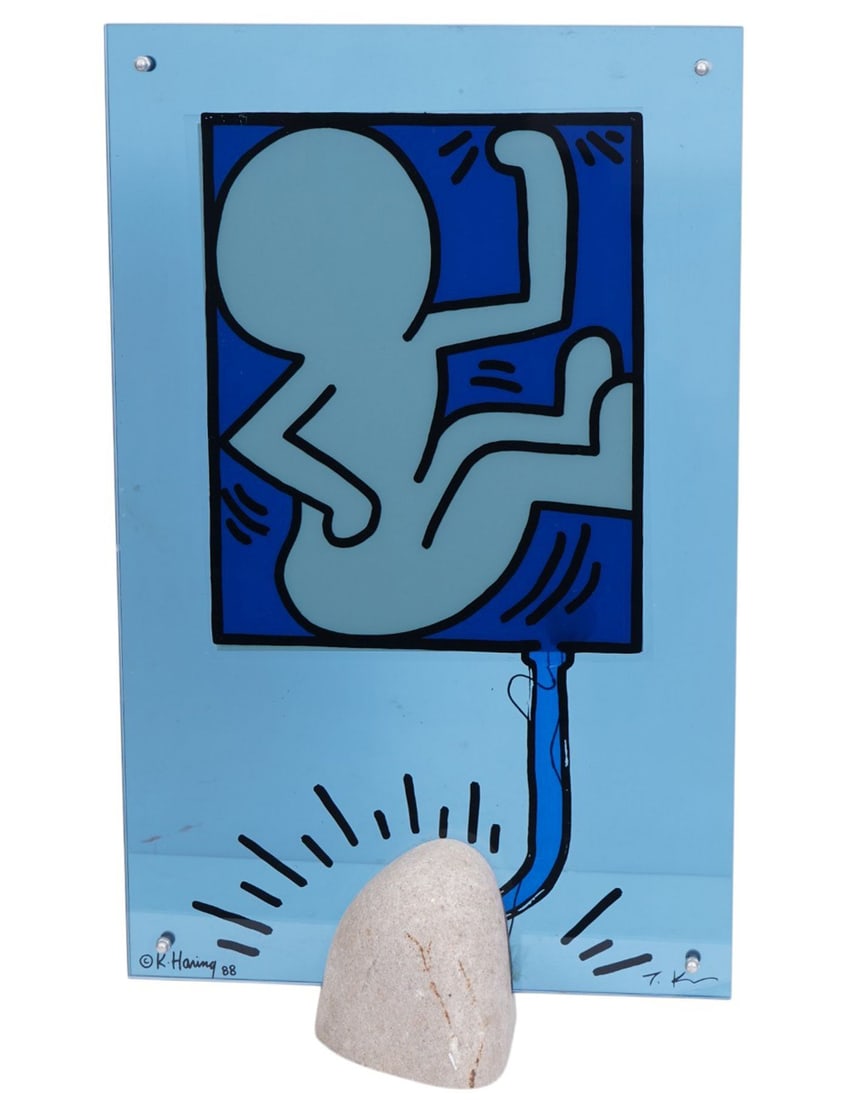 Keith Haring - Table lamp by signed and dated lower left, '88, and Toshiyuki Kita lower right.: Keith Haring - Table lamp by signed and dated lower left, '88, and Toshiyuki Kita lower right. Screen print between glass mounted on stone. Measures 21 1/8"H (with base) x 12.5"W; 19.75"H without base
