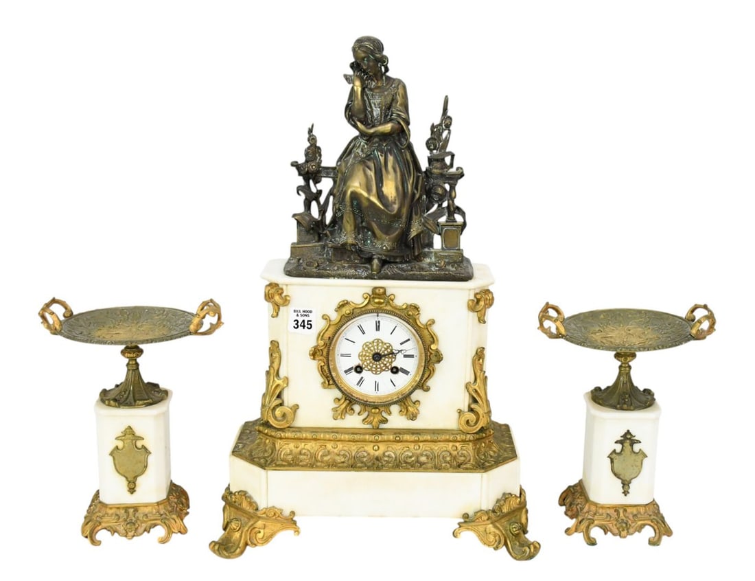 3 pc. French Marble And Bronze Clock Garniture Set. Figural clock -works marked Rango Freres, Clock: 3 pc. French Marble And Bronze Clock Garniture Set. Figural clock -works marked Rango Freres, Clock 20 1/2"h x 13 1/2"w x 7"d & Pedestals 9 1/2"h x 7"w