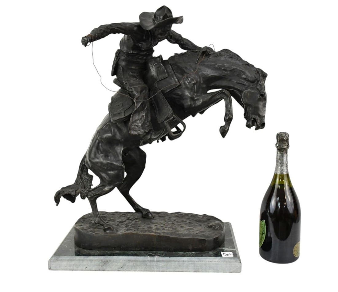 Frederic Remmington "Bronco Buster" Bronze Sculpture on Green Marble base 23" high x 17" wide x 10": Frederic Remmington "Bronco Buster" Bronze Sculpture on Green Marble base 23" high x 17" wide x 10" deep (Front and back sides of Marble appear to be unpolished)
