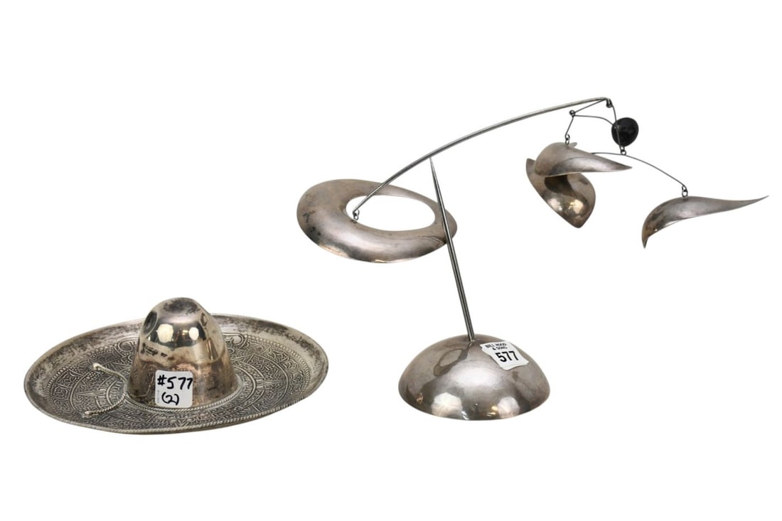 Sterling Mexican Sombrero- 8 inches diameter. Sold with small Silveroid Mobile-8 inches tall 10: Sterling Mexican Sombrero- 8 inches diameter. Sold with small Silveroid Mobile-8 inches tall 10 inches wide.