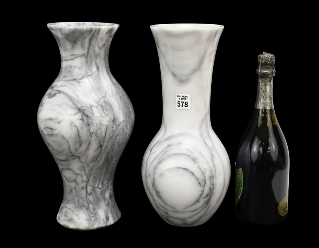 Two polished marble vases-14 inches tall and wide 6/7 inches wide.: Two polished marble vases-14 inches tall and wide 6/7 inches wide.