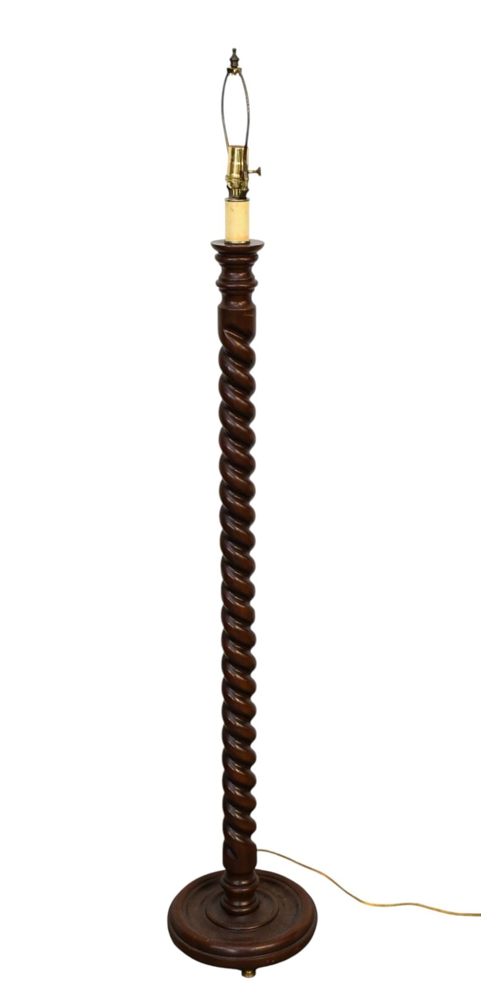 Vintage Barley Twist Mahogany Floor lamp, Circular base on 4 brass pad feet, 55" high(to socket) x: Vintage Barley Twist Mahogany Floor lamp, Circular base on 4 brass pad feet, 55" high(to socket) x 11" dia base***If this item is not picked up by the Friday following the auction, it will be moved to