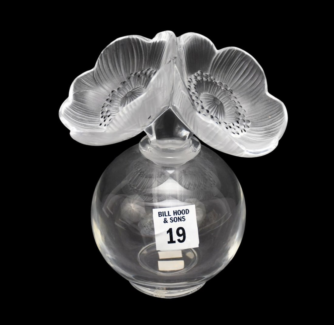 Lalique Crystal Perfume Bottle "Deux Anemones", Featuring a Frosted Flower Stopper & Clear Glass: Lalique Crystal Perfume Bottle "Deux Anemones", Featuring a Frosted Flower Stopper & Clear Glass Base, Original Made in France Sticker on Base, Signed Lalique France, 6 1/2"h 5 1/12"w x 4"d (small fle
