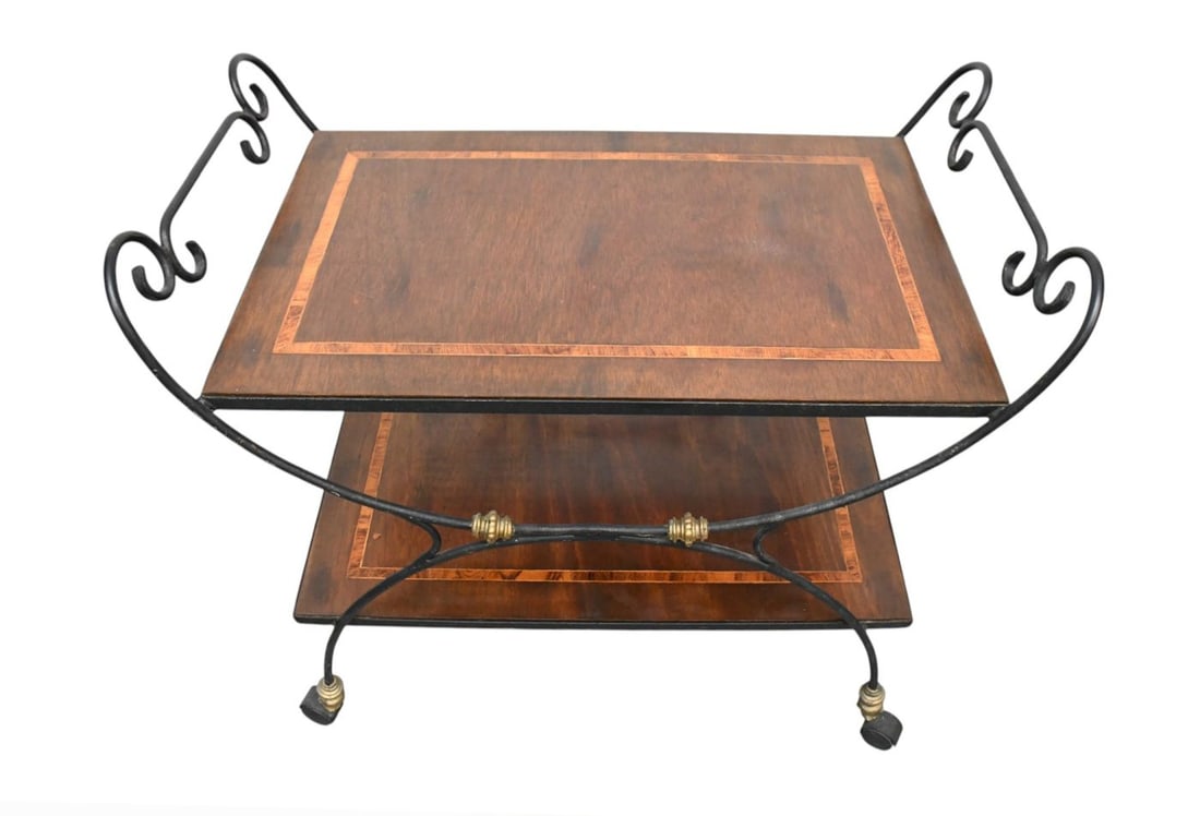 Mahogany Serving Table, 2 Tier Inlay with Iron Frame on Wheels, 34"H x 38"w x 14"d ***If this item: Mahogany Serving Table, 2 Tier Inlay with Iron Frame on Wheels, 34"H x 38"w x 14"d***If this item is not picked up by the Friday following the auction, it will be moved to offsite storage and pickup w