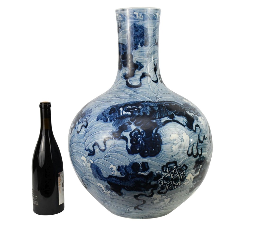 Large Chinese Ming Style Blue & White Porcelain Bottle Vase, Hand-painted Foo dog pattern, with: Large Chinese Ming Style Blue & White Porcelain Bottle Vase, Hand-painted Foo dog pattern, with Qianlong seal mark in blue underglaze. 22" high x 14" wide