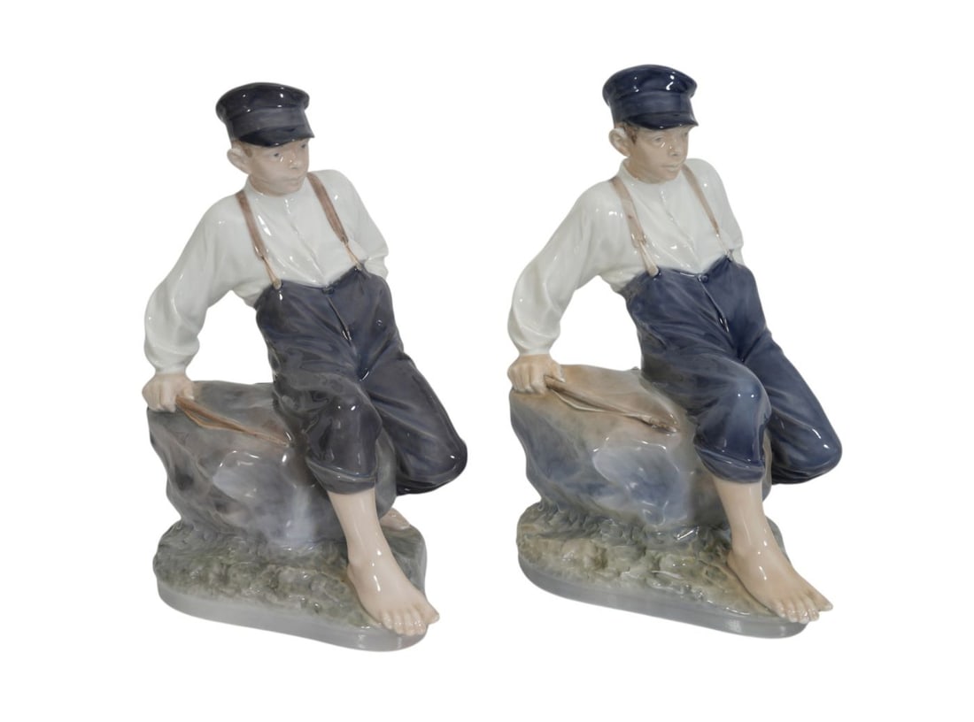 Pair Royal Copenhagen Porcelain Figures, Shepherd Boys Seated on Rocks, 12"h x 10"w x 8"d: Pair Royal Copenhagen Porcelain Figures, Shepherd Boys Seated on Rocks, 12"h x 10"w x 8"d
