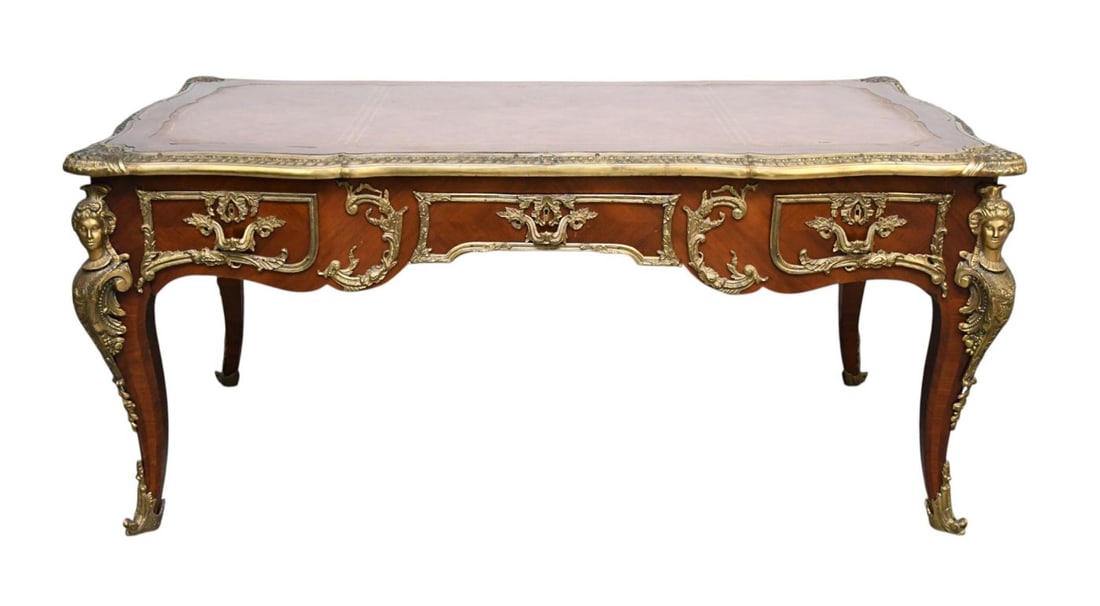 Large Fine Reproduction French Bureau Plat, 3 Side By Side Drawers with Heavy Gilt Mounts & Female: Large Fine Reproduction French Bureau Plat, 3 Side By Side Drawers with Heavy Gilt Mounts & Female Caryatid Busts, Leather Surface, 31"H x 69"w x 37"d***If this item is not picked up by the Friday fol