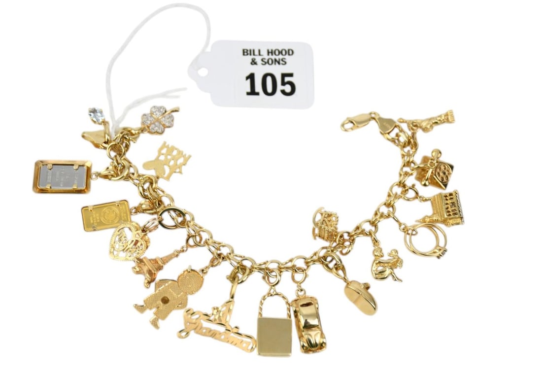 14K Yellow Gold Charm Bracelet. 7.5" wt. 44.95 grams mostly all charms 14K. 1 10K charm, 1 gram of (1 of 4)