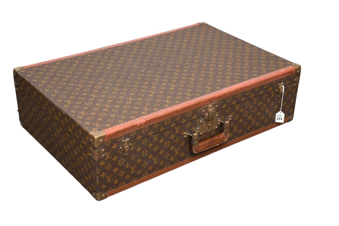 Vintage Louis Vuitton Monogram Bisten 60 M21326 Monogram Canvas Trunk Case, Individual Number: Vintage Louis Vuitton Monogram Bisten 60 M21326 Monogram Canvas Trunk Case, Individual Number Sticker Missing, Postage Stamp Size Repair to Monogram Canvas on Side of the Top, 24"w x 16"d x 7"h Overal