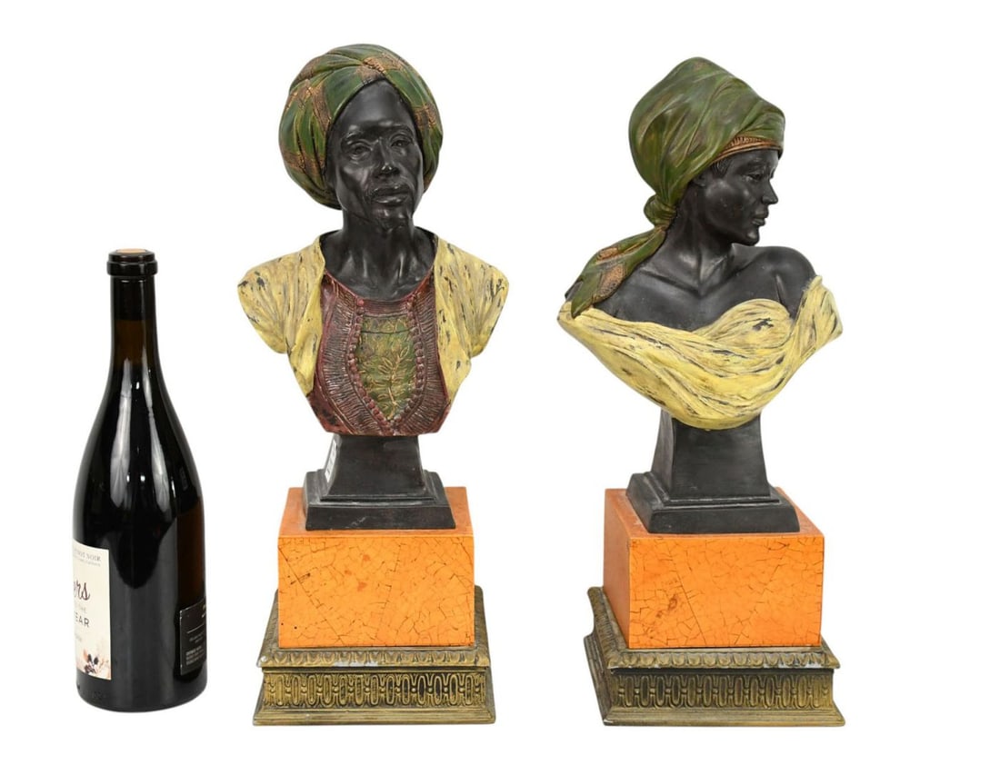 Two Bronze Nubian Busts of Male and Female with polychrome painted attire 17"h x 6"w x 6"d: Two Bronze Nubian Busts of Male and Female with polychrome painted attire17"h x 6"w x 6"d
