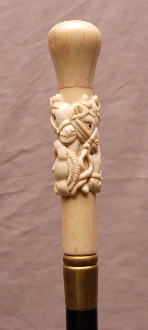 Walking stick with marine ivory horse grouping handle,: Walking stick with marine ivory horse grouping handle, 37"L