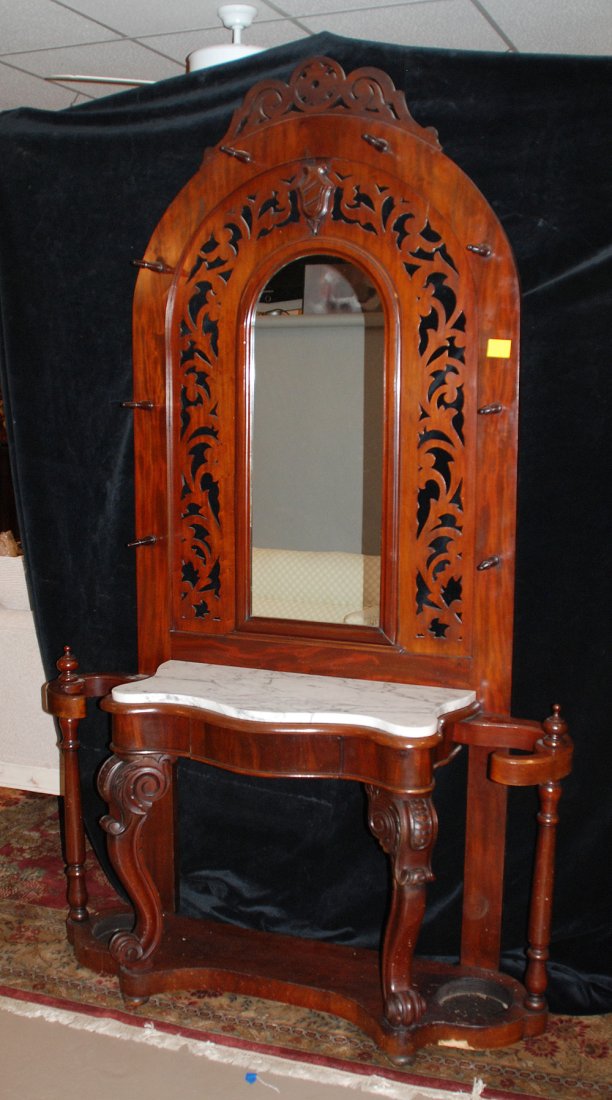 Unusual Antique Victorian walnut hall tree, fretwork: Unusual Antique Victorian walnut hall tree, fretwork above fitted marble top over single drawer with umbrella wells on either side, 75"h x 55"w