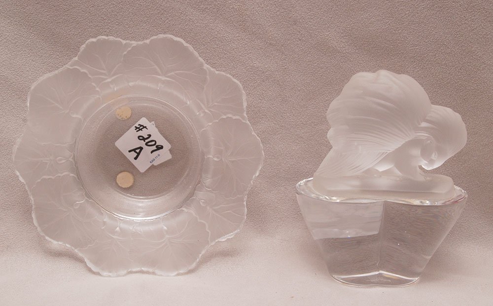 Vintage Lalique Honfleur Candy Dish w/ Geranium leaf fr: Vintage Lalique Honfleur Candy Dish w/ Geranium leaf frosted border, incised Lalique, France . 6" w x 1 1/2"h., along with a Fine & heavy Sevres Crystal Figural paper weight. Incised Sevres, France. 5