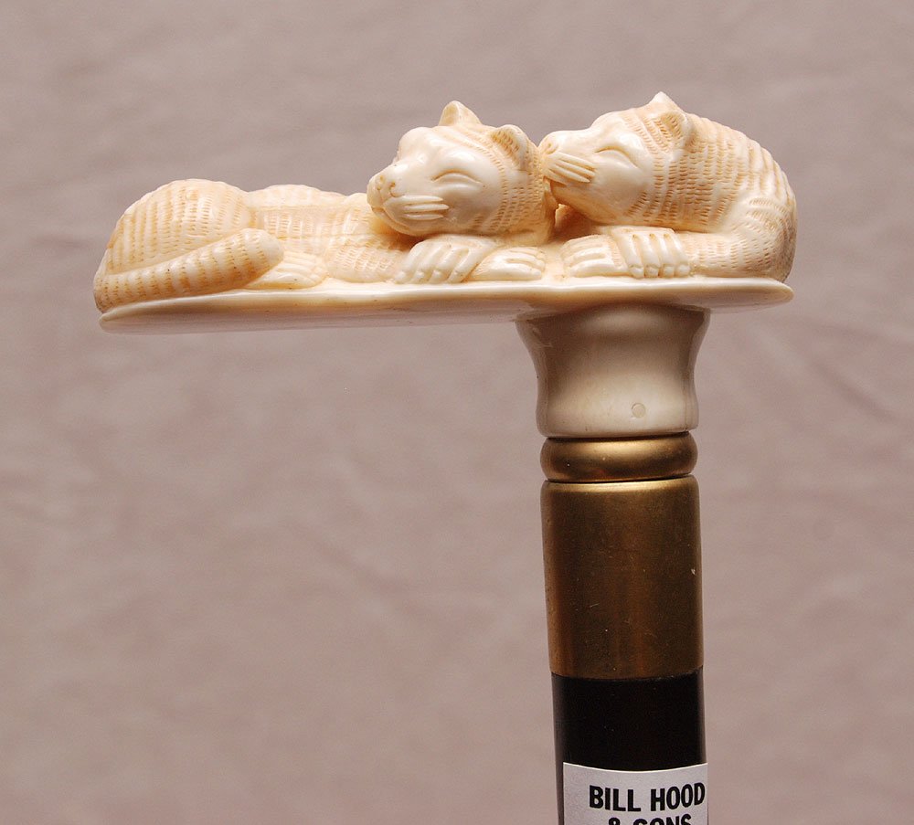 Walking stick with Marine ivory cats handle, 33 1/2"L: Walking stick with Marine ivory cats handle, 33 1/2"L