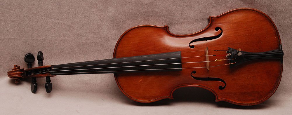Fine Saxon Violin, Unlabelled circa 1940's. Art Deco: Fine Saxon Violin, Unlabelled circa 1940's. Art Deco Tailpiece. Ribs & Scroll are OK, the back is fine, of a Golden Brown color. Good Purfling. Length of two-piece back is apprx 14 1/8"., with a woode