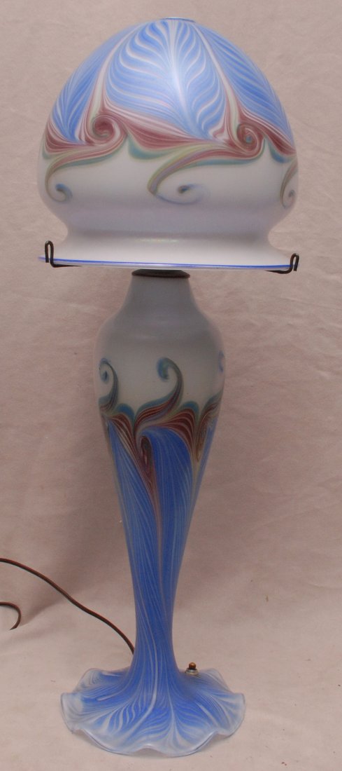 Vintage unsigned 2 pc. Art glass lamp, feathering in: Vintage unsigned 2 pc. Art glass lamp, feathering in blue, wine and green on white ground, 26"h