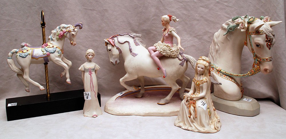 Collection of 5 Cybis figures, incl; carousel horse (8: Collection of 5 Cybis figures, incl; carousel horse (8 1/2"h), horse head (11"h), lady on horse (12"h), lady seated (broken finger) (7 3/4"h) and standing child, (8 1/2"h)