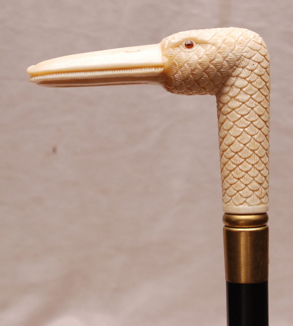 Walking stick with marine ivory swan head handle, 38"L: Walking stick with marine ivory swan head handle, 38"L **Hairline Crack