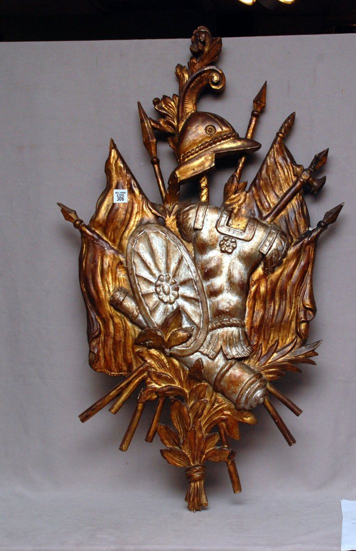 Antique Italian giltwood carving depicting sheild, spea: Antique Italian giltwood carving depicting sheild, spears and helmet arrangement, 37" x 22" (good condition with minor losses)